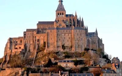 I visited Mont Saint-Michel in Normandy this past week! What are some similar places that occupy geographically isolated and_or self-contained communities?